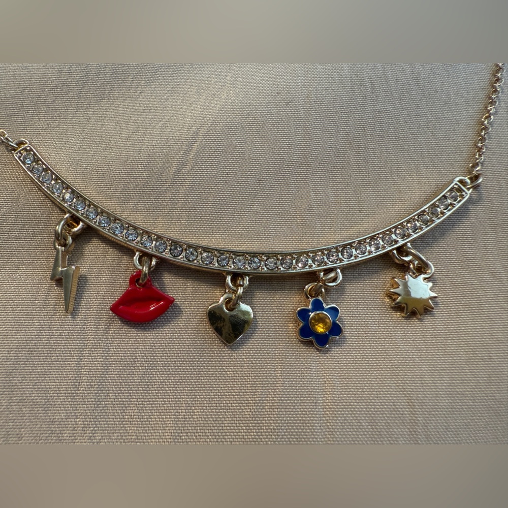 Betsey Johnson Gold Necklace with Red and Blue Charms. Shaky Charm